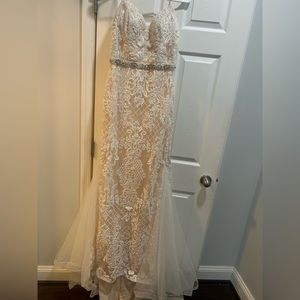 I bought 3 different dresses for my wedding! But I endeup using just one !